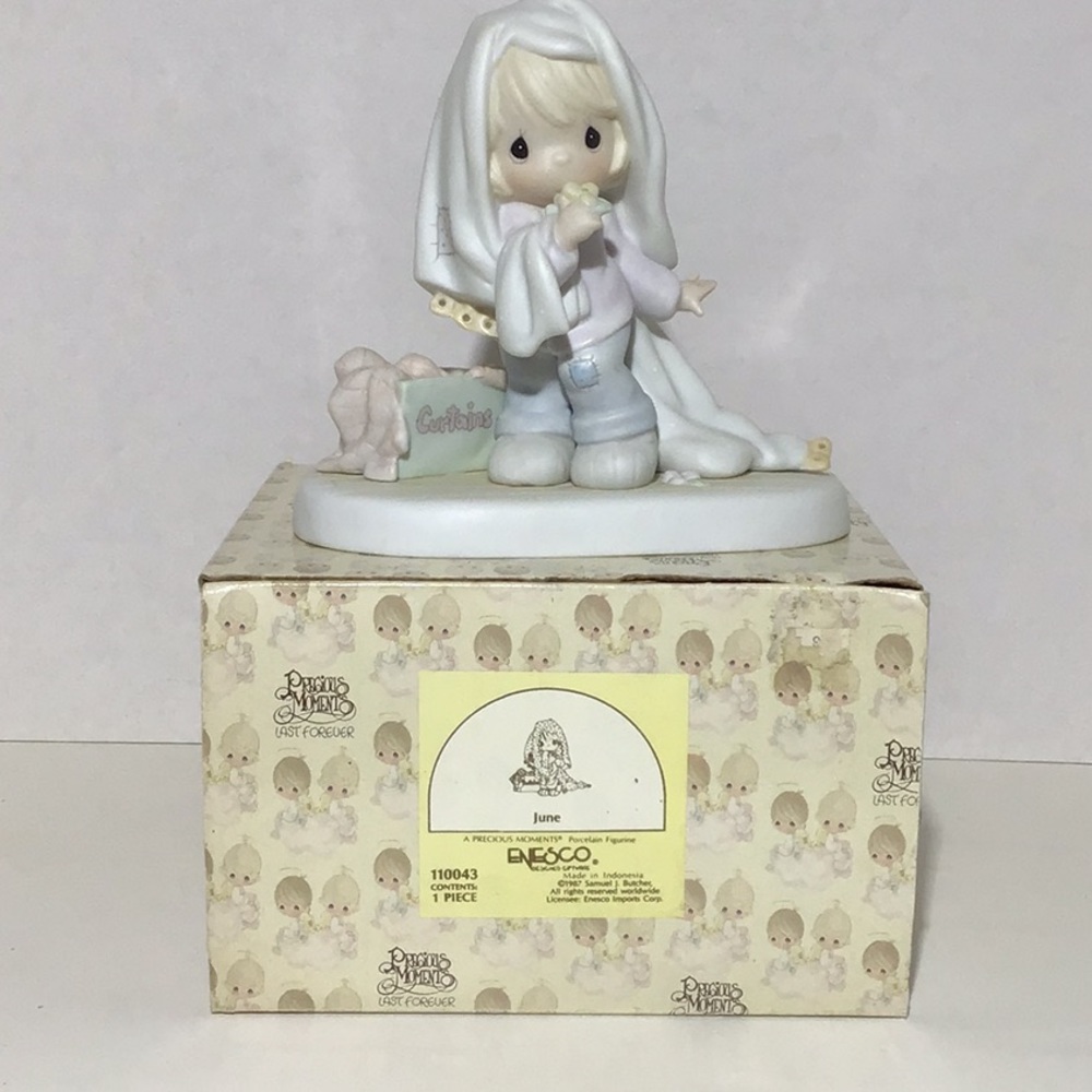 Precious Moments Porcelain Figurine